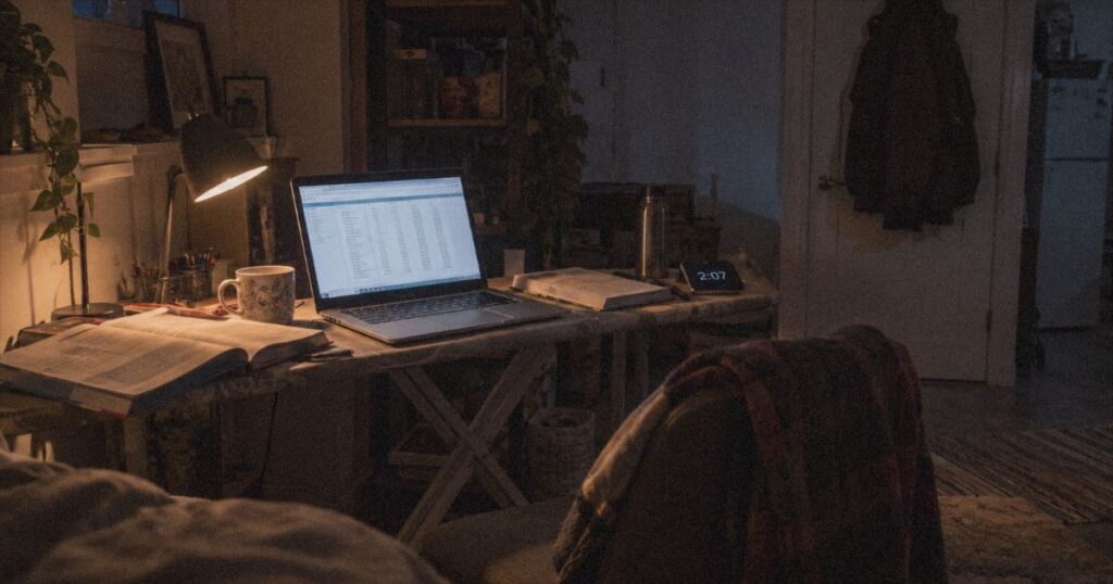 Express Entry CRS 2026: checking draw results late at night in a Toronto basement apartment