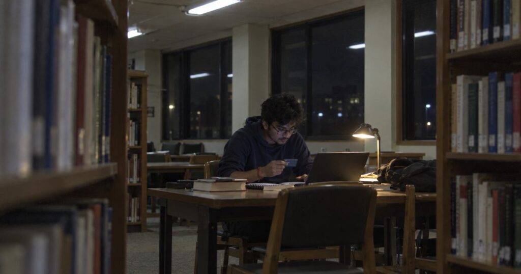 Build credit as an international student: studying personal finance in the library